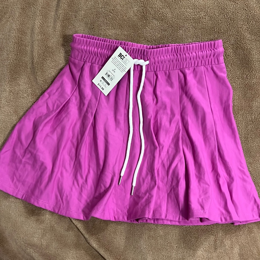 Soft pleated fushia skirt